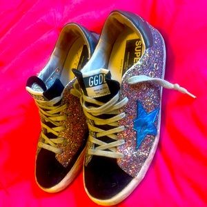 I am selling my golden gooses that I got not even a year ago brand new.